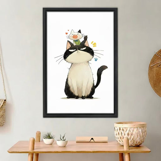 Grumpy cat and kitten funny wall art print in black frame above wooden desk, cute Japanese-style illustration