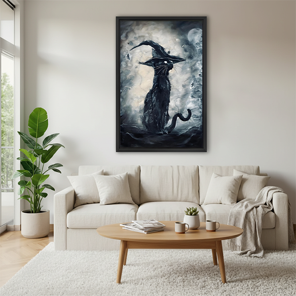 Woman holding framed gothic black witch cat canvas wall art featuring a crooked hat and swirling gray mist.