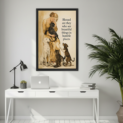 Woman in yellow floral dress holding black cat surrounded by white labrador tabby cat and dachshund vintage watercolor illustration with blessed beautiful things humble places quote framed wall art hung on light grey wall above white desk with MacBook black lamp succulent and stacked books beside large palm plant