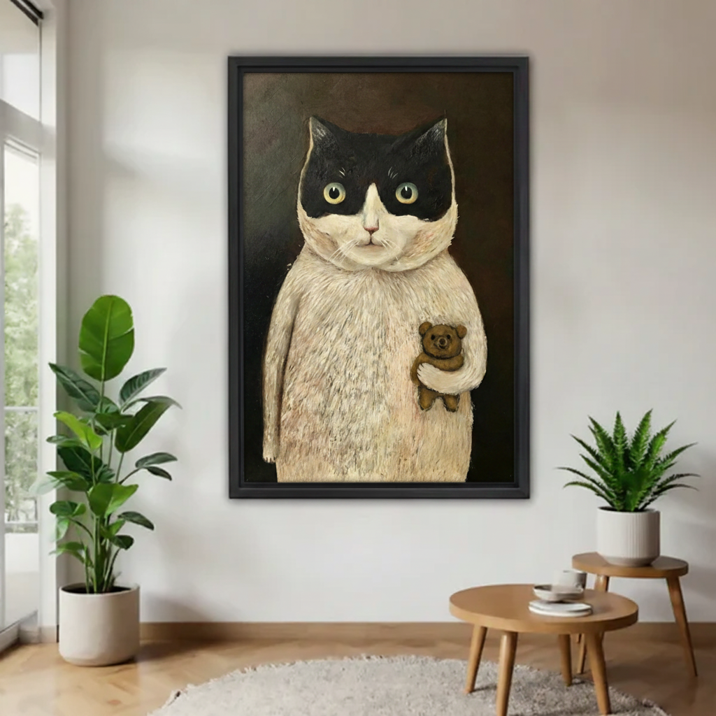 Whimsical tuxedo cat teddy bear framed canvas print displayed on white wall with indoor plants