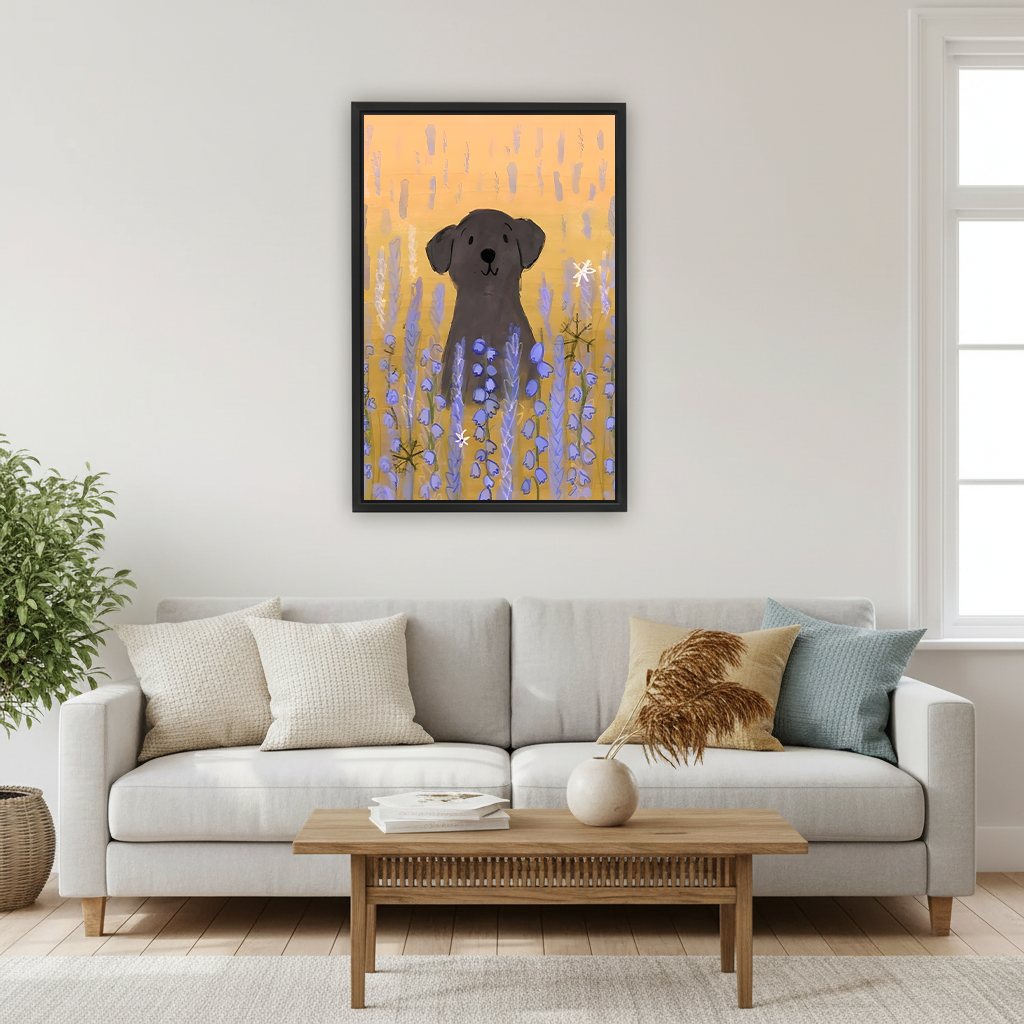 Black labrador dog sitting in purple bluebell flower field warm orange background boho hand-painted illustration framed wall art hung on white wall above cream sofa with linen cushions wooden coffee table and pampas grass vase in Scandinavian living room