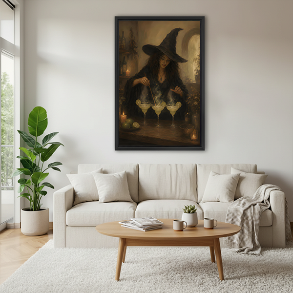 Framed witch cocktail canvas wall art on a sage bedroom wall above a rattan bed with terracotta linens