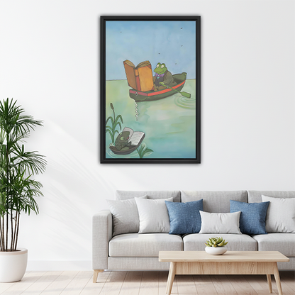 Funny reading frog framed wall art above gray sofa in bright living room — eclectic home decor
