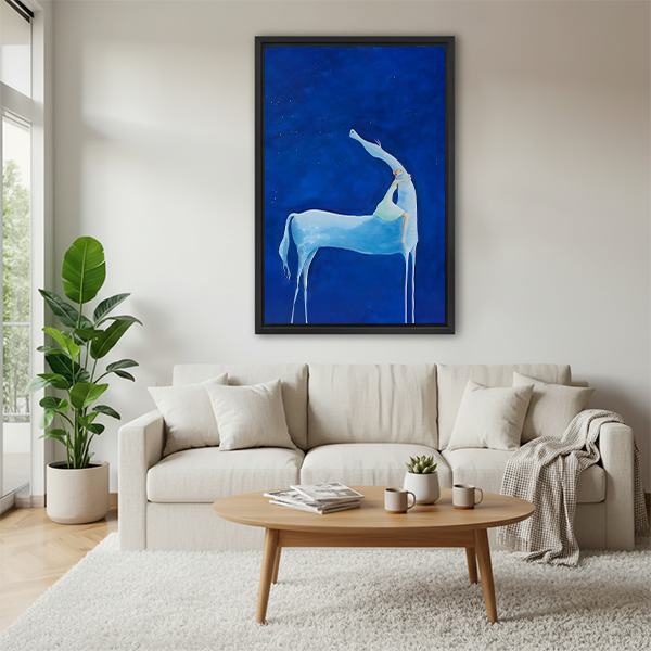 Elegant blue deer night sky wall art above white sofa in Scandinavian living room