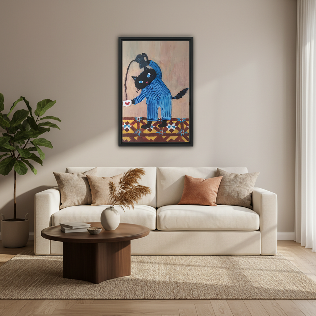 Whimsical black cat in pajamas holding coffee framed wall art above cream sofa with fiddle leaf fig in modern living room
