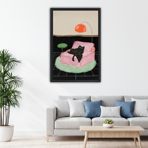 Mid-century modern black cat framed canvas print above living room sofa
