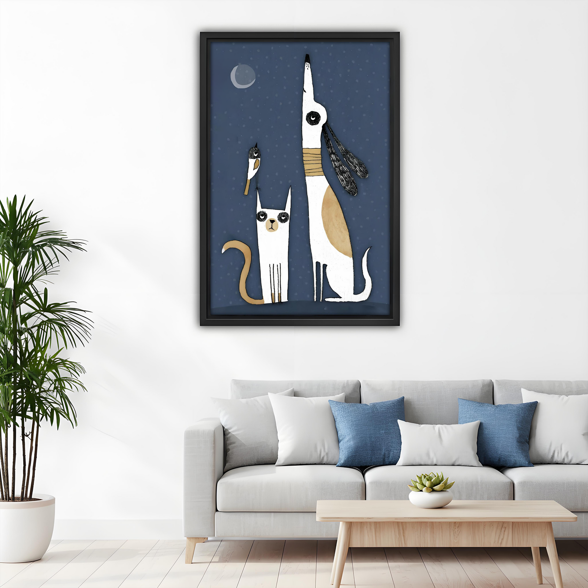 Whimsical cat and dog moon framed canvas wall art above sofa, midnight blue living room decor, black frame animal print
