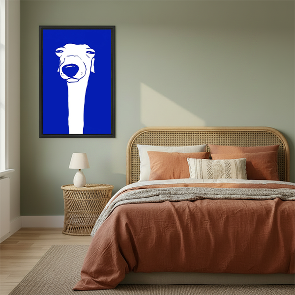 Bold blue greyhound modern minimalist framed canvas wall art hanging in cozy boho bedroom above rattan bed with terracotta bedding