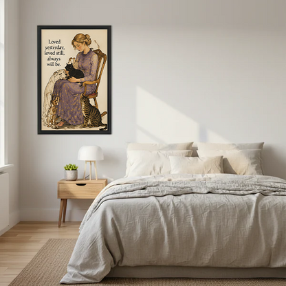 Woman in lavender floral dress sitting on wooden chair holding black cat with white long-haired dog beagle and tabby cat beside her vintage watercolor illustration with loved yesterday loved still always will be quote framed wall art hung on white wall above Scandinavian bed with grey linen bedding wooden nightstand white lamp and small succulent