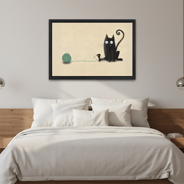 Black cat yarn ball framed canvas print above bed – cute minimalist wall art for bedroom decor
