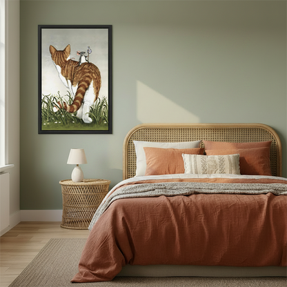 Framed cat and mouse illustrated print above a boho bedroom bed with terracotta bedding, vintage animal wall art for bedroom