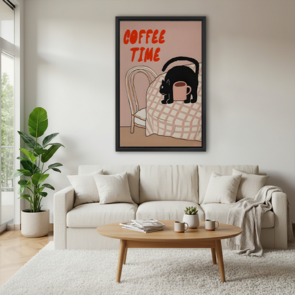 Black-framed Coffee Time black cat canvas wall art showing a cat on a checkered table, displayed beside plants.