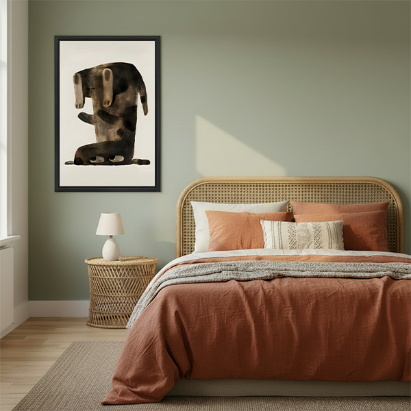 Whimsical dachshund dark abstract framed canvas wall art hanging in cozy boho bedroom above rattan bed with terracotta bedding