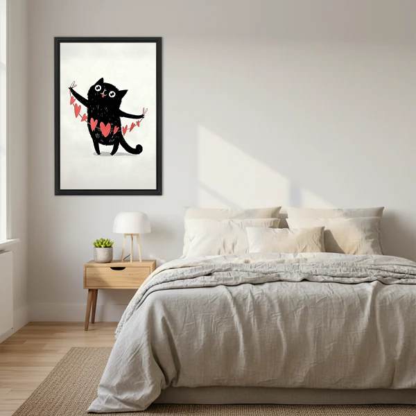 Cute black cat heart banner illustration framed wall art print displayed above bed in cozy minimalist bedroom