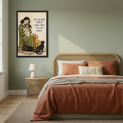 Woman in green floral dress sitting on rug holding dalmatian puppy with yellow labrador black cat and tabby cat beside her vintage watercolor illustration with they are our peace quote framed wall art hung on sage green wall above rattan bed with terracotta bedding wicker nightstand and white table lamp