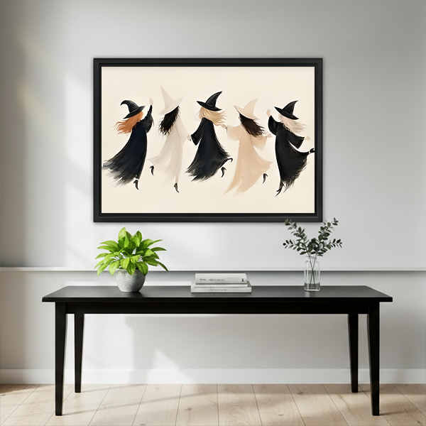 Framed minimalist witch coven Halloween canvas wall art displayed above a console in a bright living room