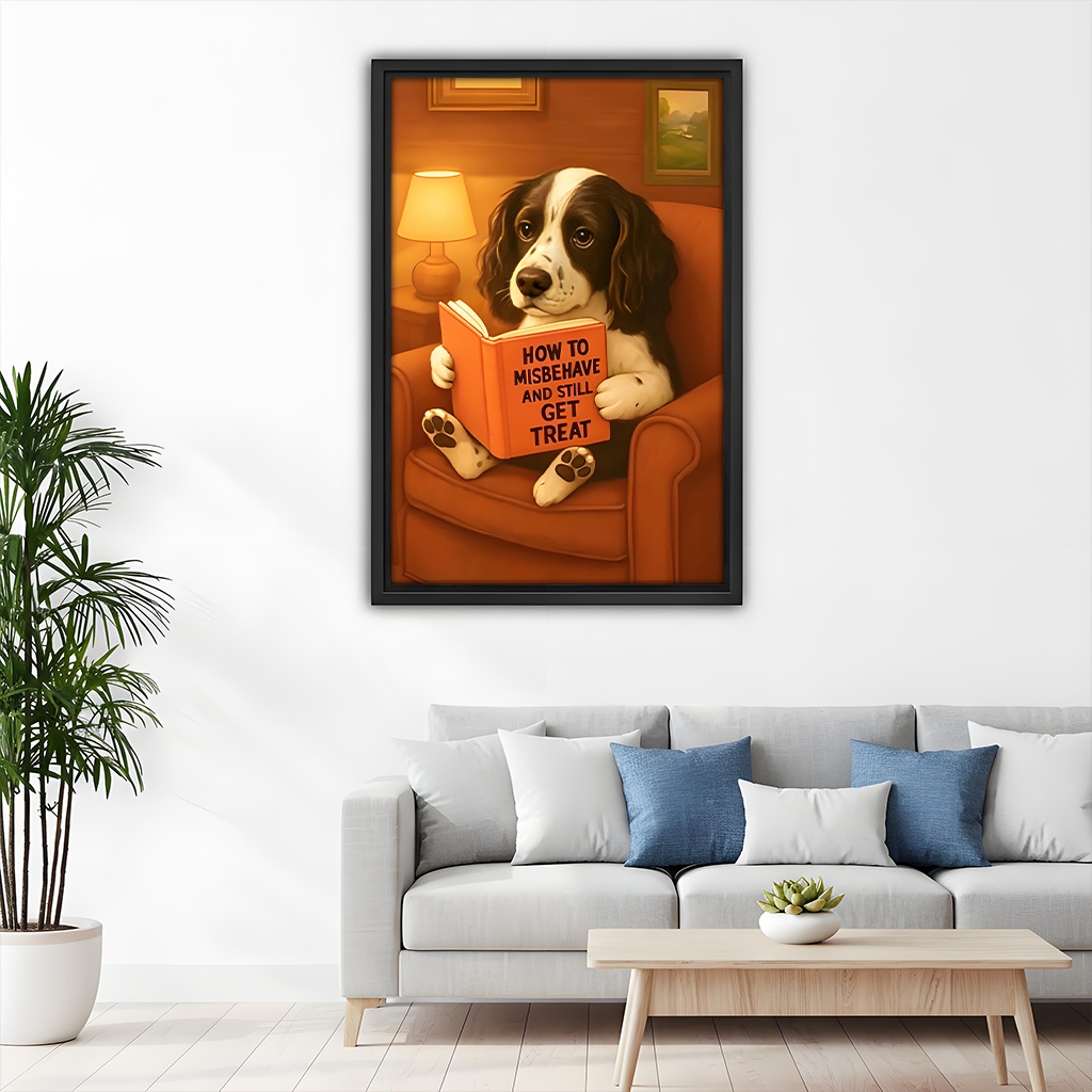 Vintage funny dog reading wall art print in black frame above gray sofa in minimalist living room with blue cushions