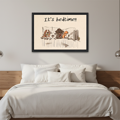 It's Bedtime four dogs in bed funny whimsical framed canvas wall art in black frame above cream linen sofa in bright Scandinavian living room with green plant