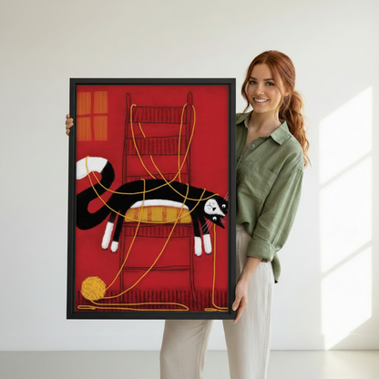 Woman holding large tuxedo cat tangled in yarn whimsical framed canvas print — bold red cat wall art gift for cat lovers
