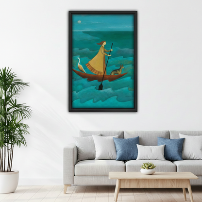 Framed wall art print of a woman paddling a boat with a heron and dog on teal ocean waves, displayed above a modern living room sofa