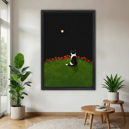 Black cat moon rose garden minimalist framed canvas wall art – black frame, hung in bright Scandinavian living room with cream sofa and tropical plant