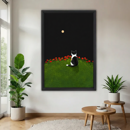 Black cat moon rose garden minimalist framed canvas wall art – black frame, hung in bright Scandinavian living room with cream sofa and tropical plant