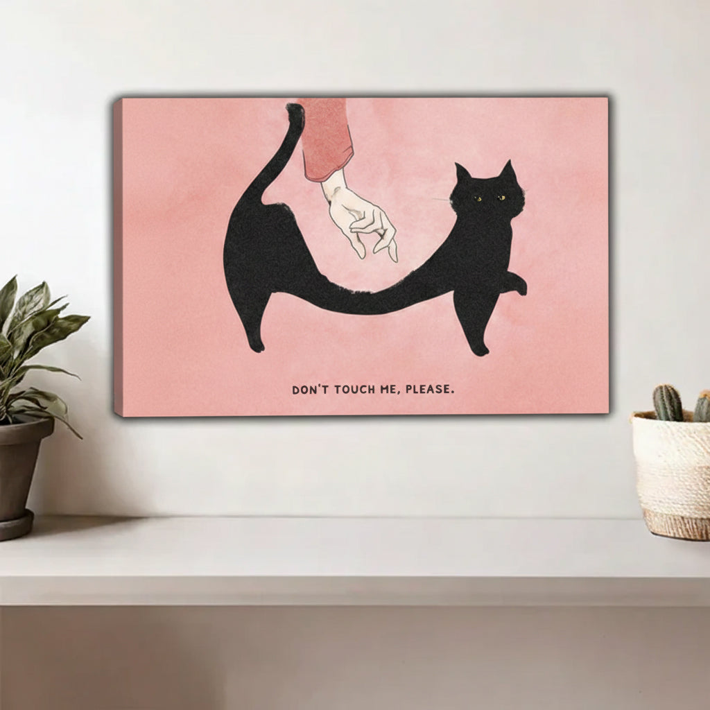 Funny black cat Don't Touch Me canvas print displayed as frameless gallery wrap on white wall above a shelf with cactus