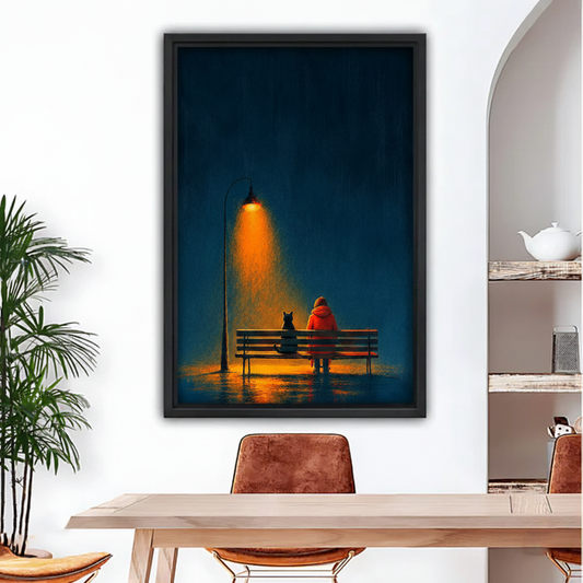 Moody night cat and person bench framed canvas wall art, black frame, atmospheric dark teal oil painting with warm streetlamp glow, displayed in a modern dining room with wooden table