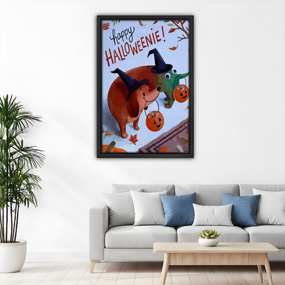 Black-framed Halloween dachshund canvas wall art above a gray sofa with blue cushions in a bright living room.