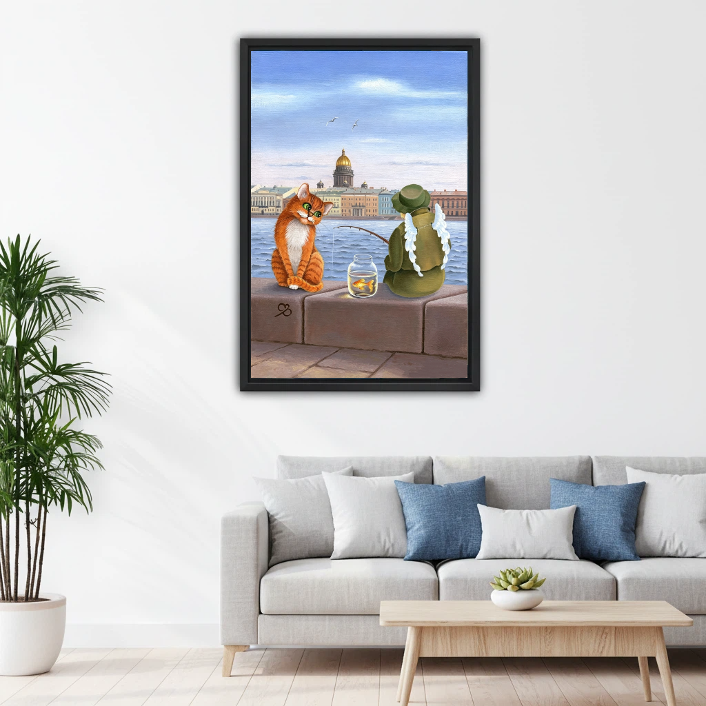 Whimsical cat fishing canvas wall art in black frame above gray sofa in minimalist Scandinavian living room