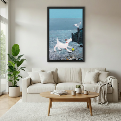 Coastal dog and seagull beach scene framed canvas wall art above cream sofa in bright Scandinavian living room