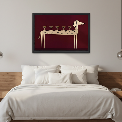 Black-framed martini dog canvas wall art with a spotted dog balancing cocktail glasses above a cream sofa.
