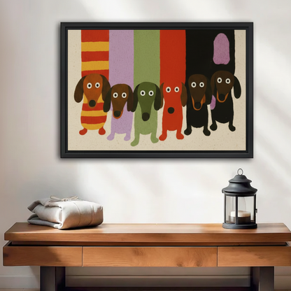 Whimsical dachshund gang framed canvas wall art hung above wooden console table with lantern, colorful retro dog print, black frame, minimalist entryway