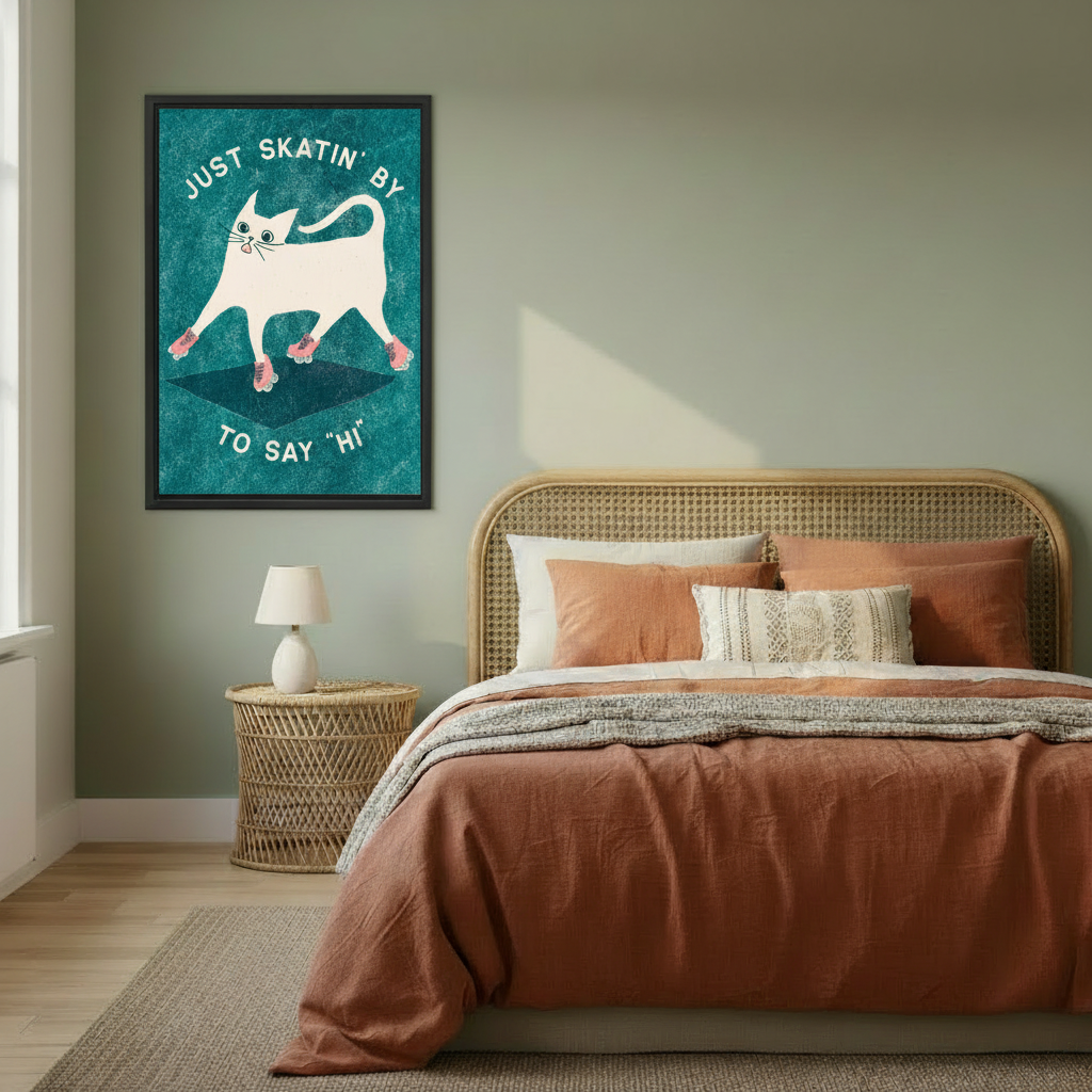 White cat roller skating "Just Skatin' By To Say Hi" framed wall art, black frame, teal retro illustration, styled in a warm boho bedroom with sage green walls and rattan headboard