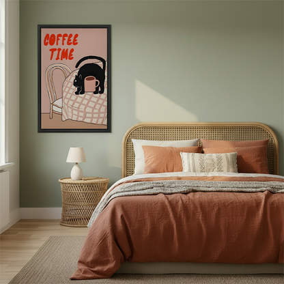 Framed Coffee Time black cat canvas wall art beside a rattan bed with terracotta bedding in a green bedroom.