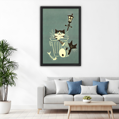 Gallery-wrap alley cats canvas wall art above a dining table, featuring two cats, a trash can, and a fish skeleton.