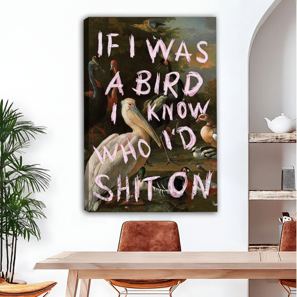Funny bird quote canvas wall art "If I Was A Bird I Know Who I'd Shit On", frameless gallery wrap, vintage bird oil painting style, hung above a wooden dining table with leather chairs in a modern eclectic dining room with indoor palm