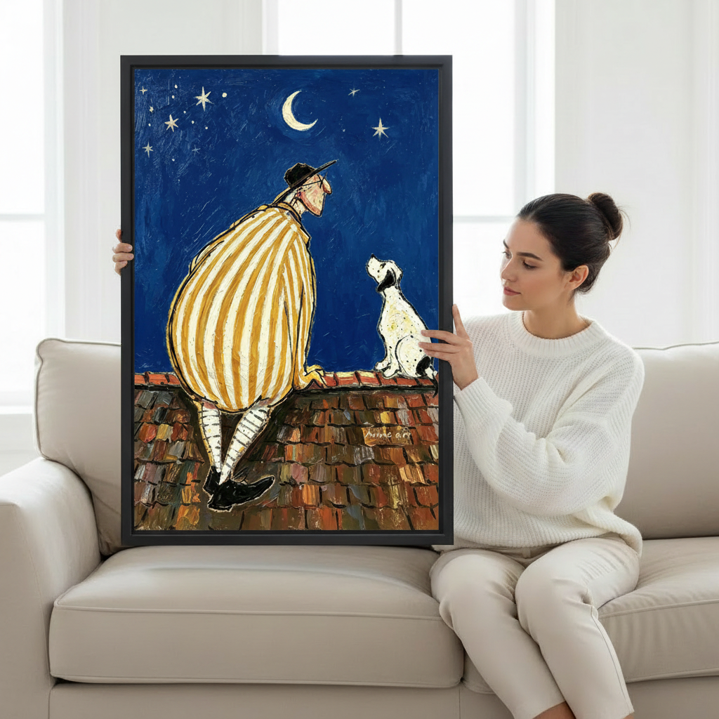 Woman holding large framed man and dog rooftop starry night moon oil painting wall art print in black frame showing actual print size on cream sofa in bright minimalist living room