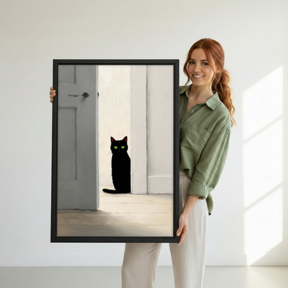 Woman holding large framed black cat green eyes white doorway minimalist oil painting wall art print in black frame showing actual print size in bright minimalist white studio