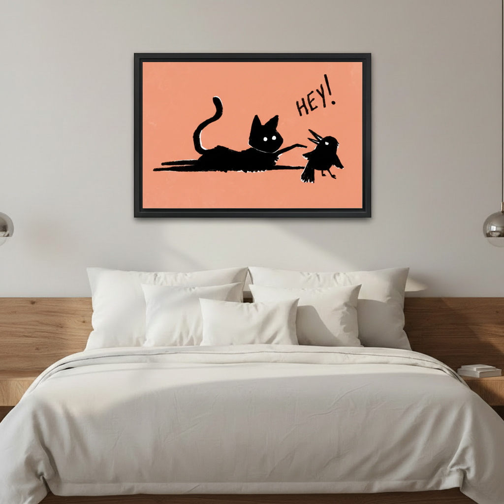Black cat tapping a bird cute canvas print — woman holding framed art in a bright modern interior