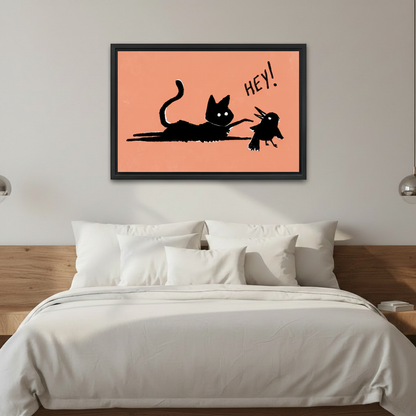 Black cat tapping a bird cute canvas print — woman holding framed art in a bright modern interior