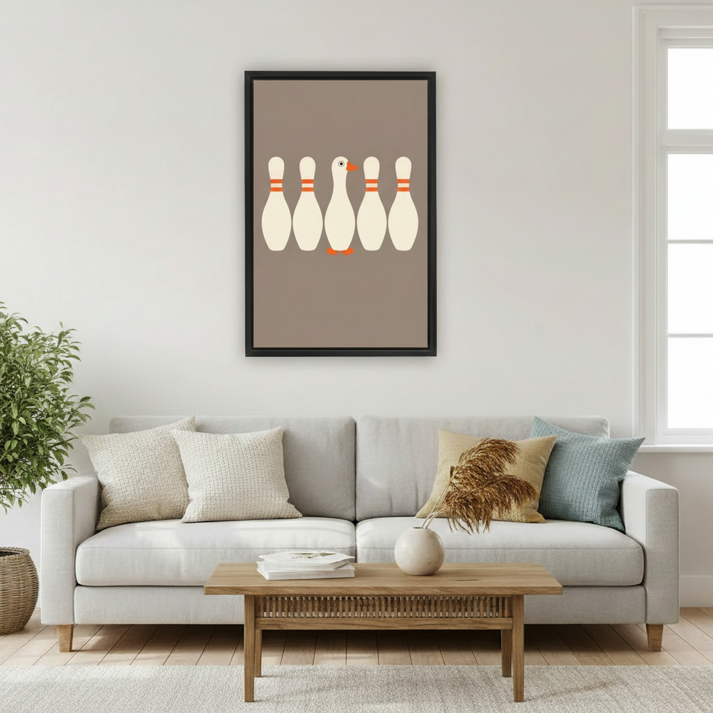 Humorous duck disguised as bowling pin minimalist wall art print in black frame above light grey sofa with oak coffee table and pampas grass vase in Scandinavian living room