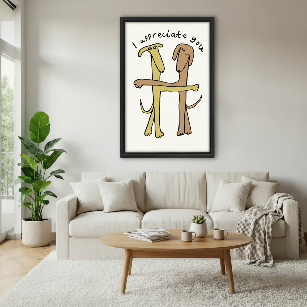 "I Appreciate You" funny dogs hugging framed art print, black frame, whimsical cartoon illustration on cream background, hung above a cream linen sofa in a bright Scandinavian living room with fiddle leaf fig and round coffee table