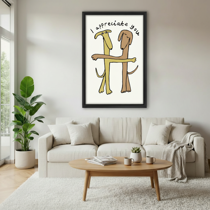 "I Appreciate You" funny dogs hugging framed art print, black frame, whimsical cartoon illustration on cream background, hung above a cream linen sofa in a bright Scandinavian living room with fiddle leaf fig and round coffee table