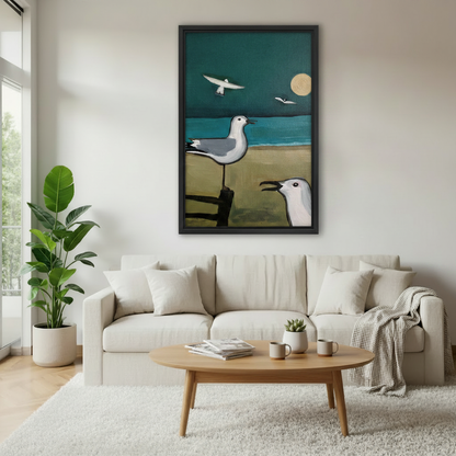 Framed seagull wall art above sofa, moody coastal bird scene with teal sky and golden moon, living room beach canvas decor

