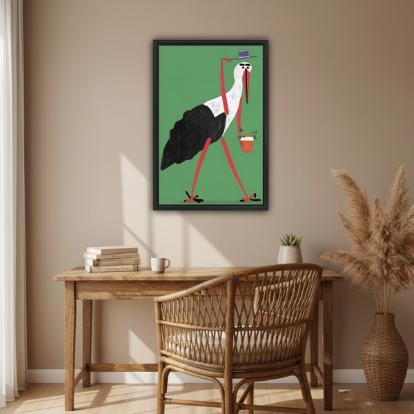 Gentleman stork coffee canvas wall art, black framed green bird illustration, displayed above wooden desk with rattan chair in boho home office