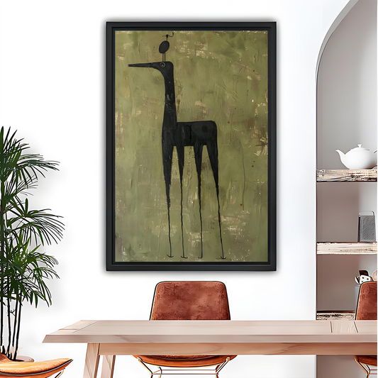 Abstract black giraffe canvas wall art in a black frame above a dining table with an olive background.