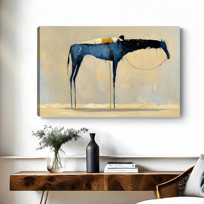 Abstract blue horse canvas art print with expressive dripping paint and gold detail on beige background, displayed above a wooden console table