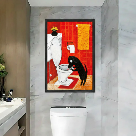 Funny black dog drinking from toilet black framed wall art print in marble bathroom