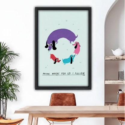 Colorful dachshund family framed canvas wall art — one large purple dachshund with three small puppies on mint green background, black frame, dining room wall decor